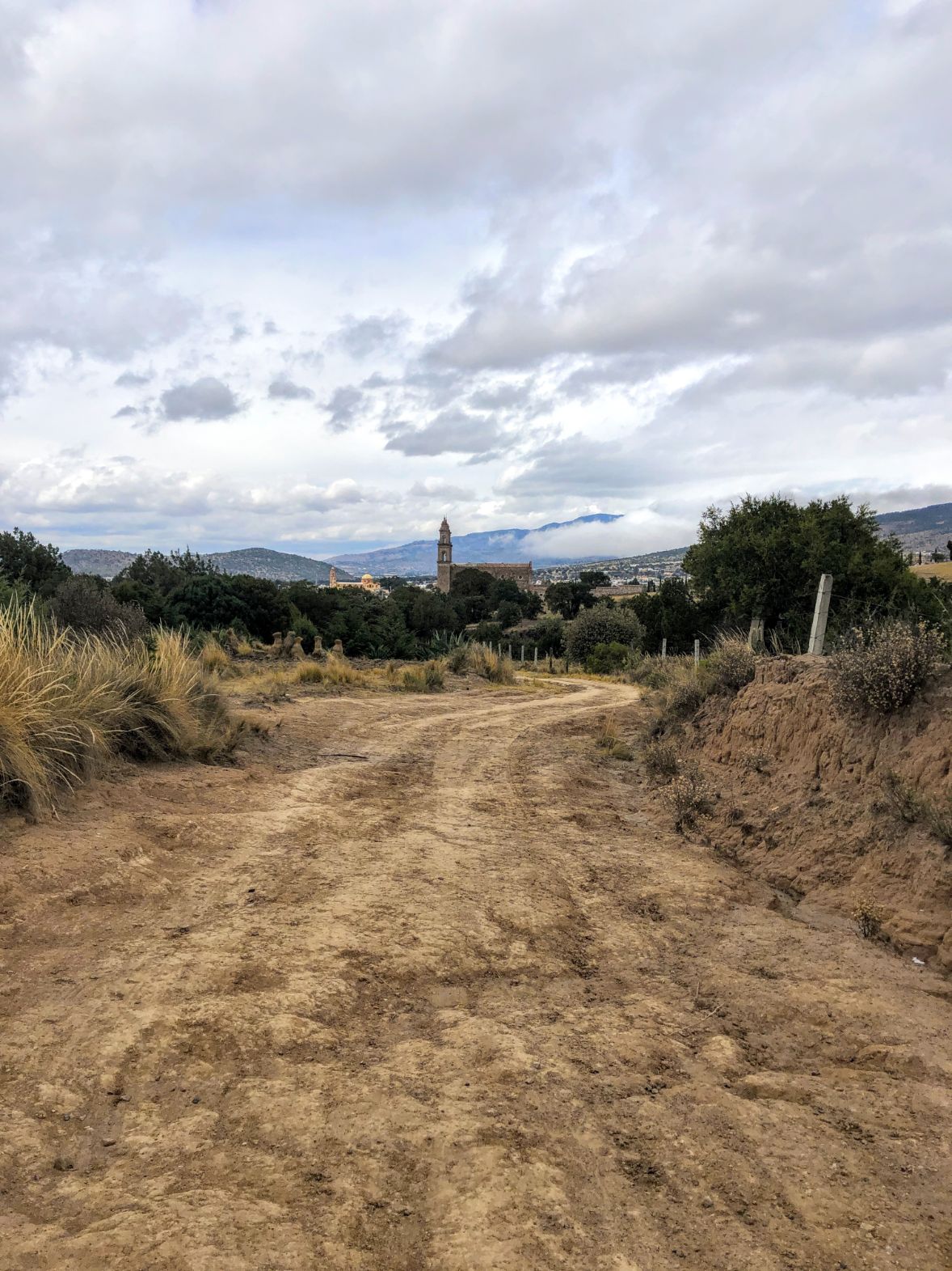 dirt road that leads to the Tlaxco slot canyons on either side
